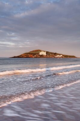 burgh island surrounded by waves