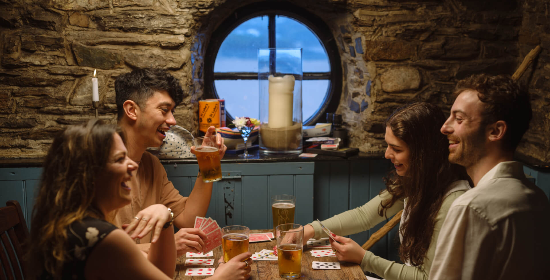 People playing cards at the Pilchard Inn
