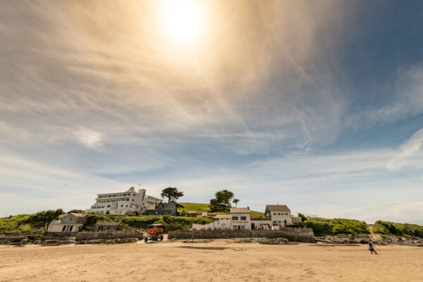 Sun over Burgh Island and Bigbury Beach in Devon