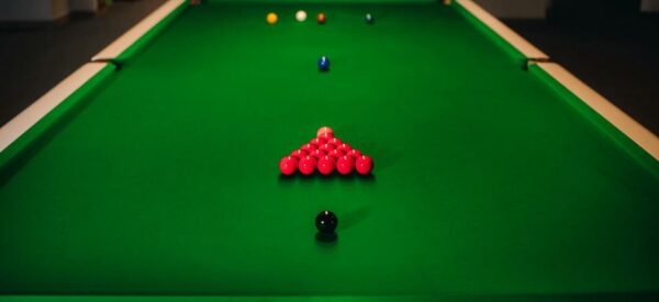 Snooker table laid out with balls